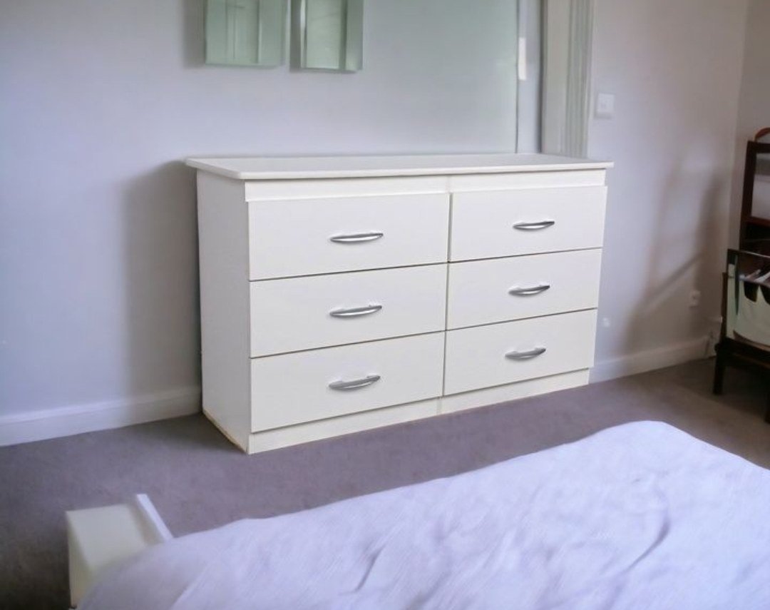 Elegant White 6-Drawer Dresser with Curved Silver Handles
